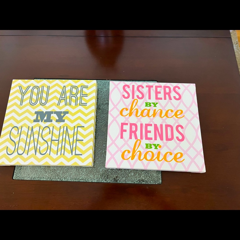 Two adorable canvas wall hangings